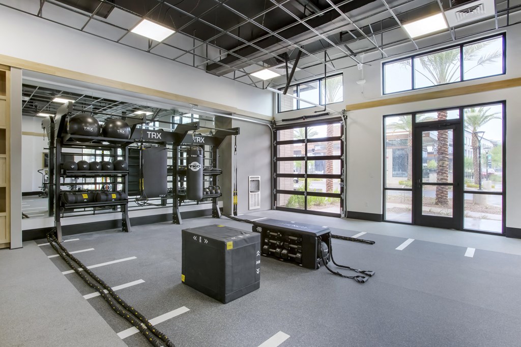 a large room with equipment and windows in a building
