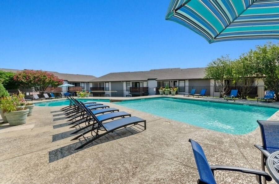 Resort style swimming pool with sundeck