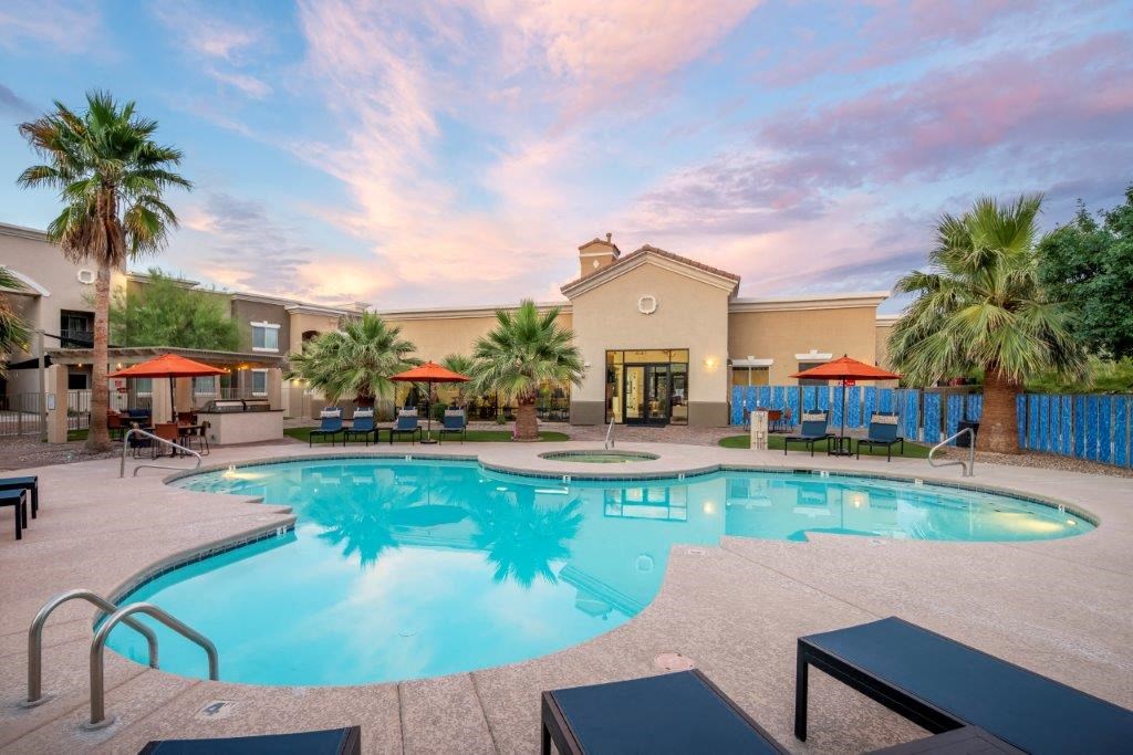 Outdoor pool area and apartment exterior