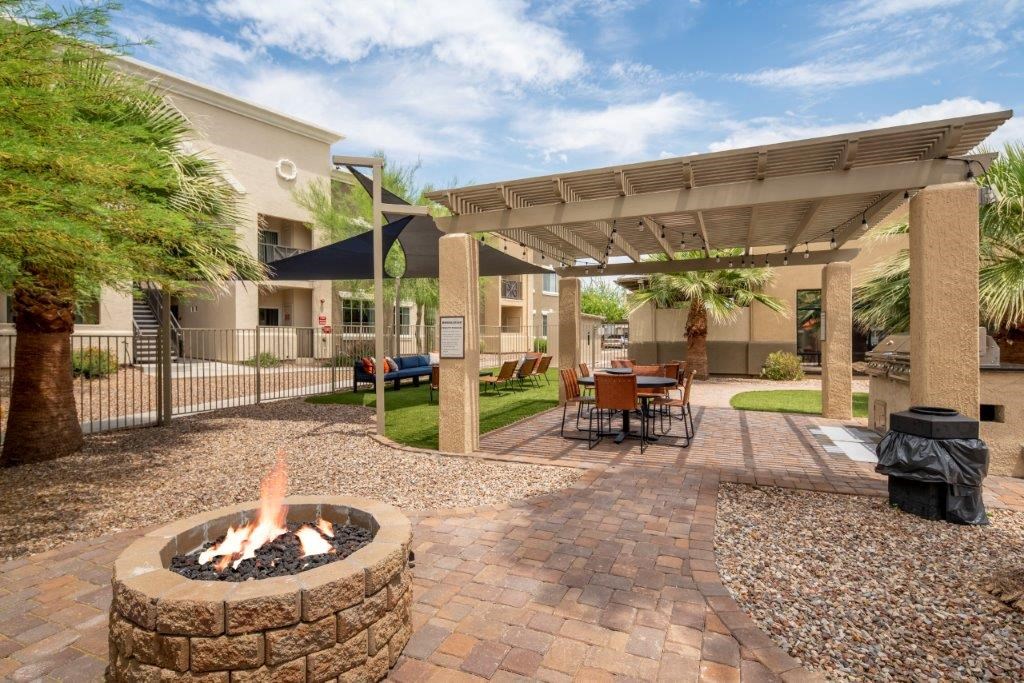 outdoor lounge area and fireplace