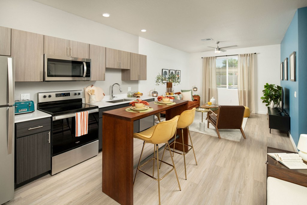 a kitchen and dining area in a 555 waverly unit