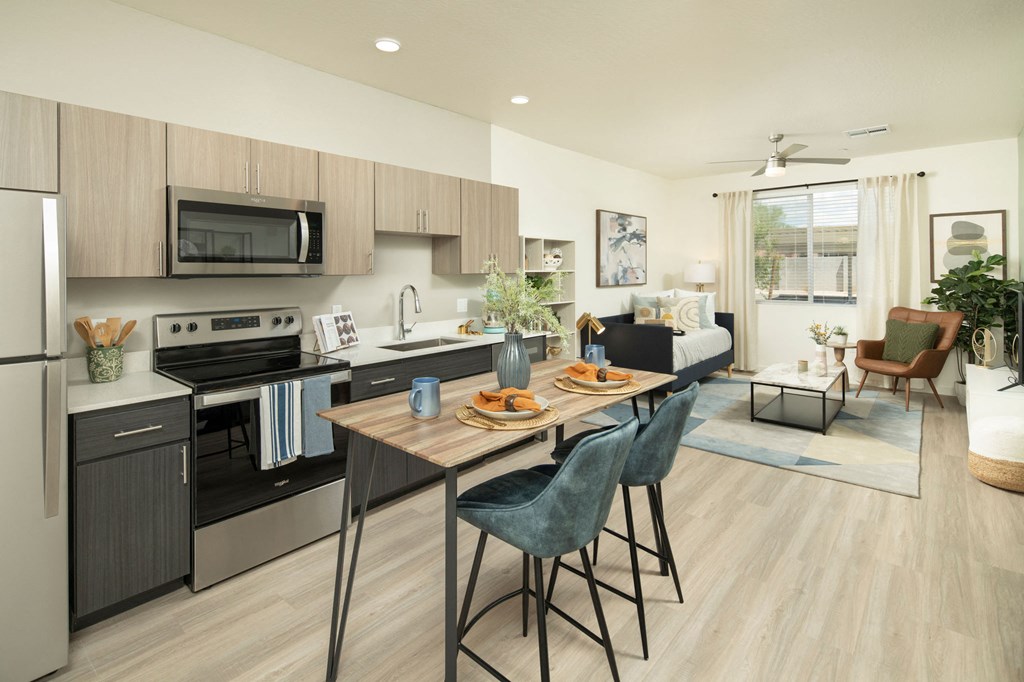 a kitchen and living room in a 555 waverly unit