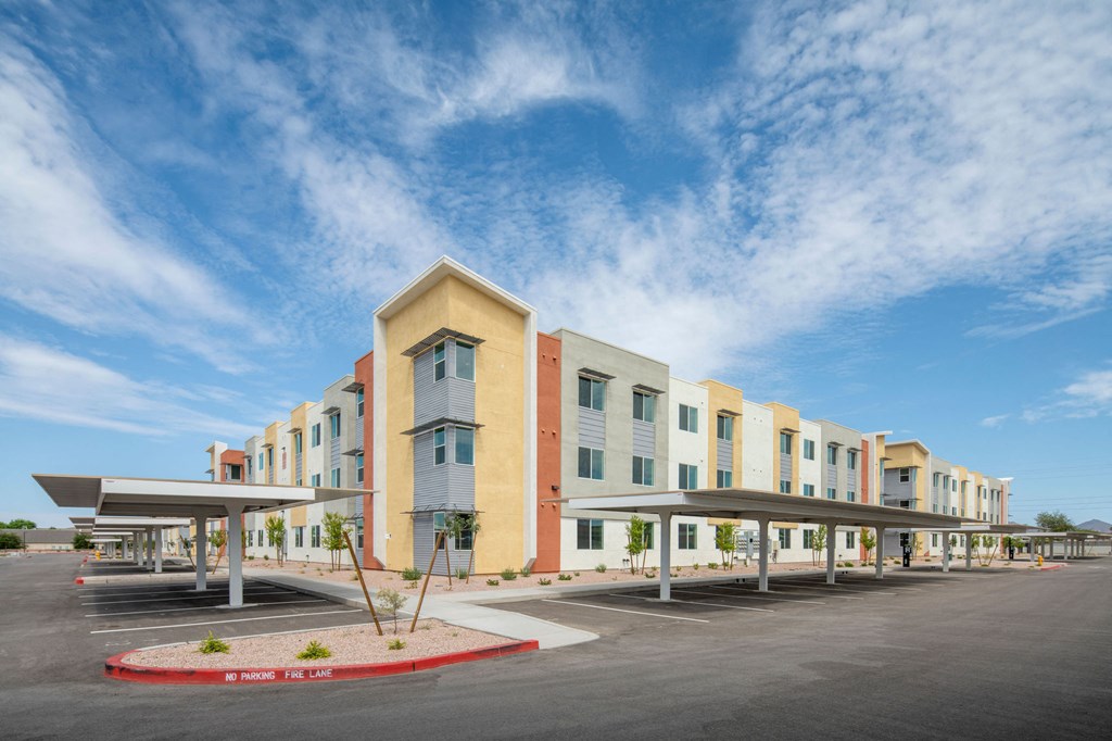 a building with a parking lot in front of it