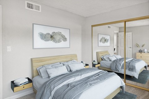 3-Bedroom Apartments in East Tucson, AZ - Hampton Park - A Bedroom With A Light Wood Bed, Gray And White Bedding, Floating Nightstands, Wall Art, And Mirrored Sliding Closet Doors.
