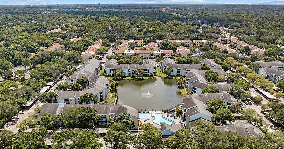 Aerial view of the lake and the apartment community