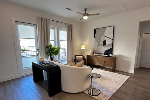 a living room with a couch and a table