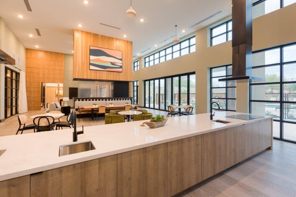 Community kitchen with view of dining tables