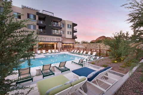 Swimming pool with view of red-rock mountains