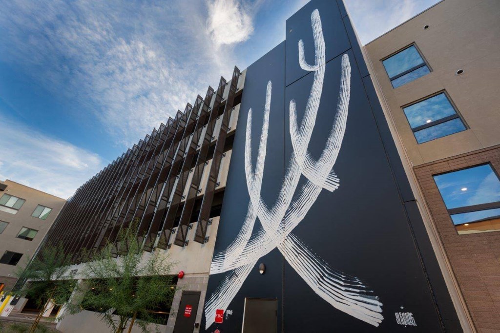 Apartment building exterior with wall art