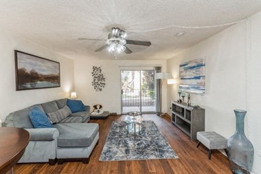 Model living room with sliding glass door