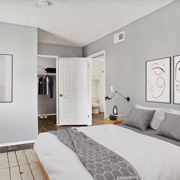 Model bedroom at Parkway Club Apartments - Photo Gallery 5