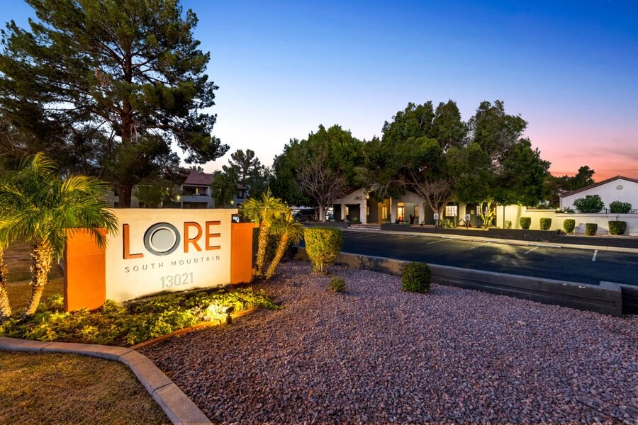 a sign that says love town homes on the side of a road at Lore South Mountain, Phoenix, 85044