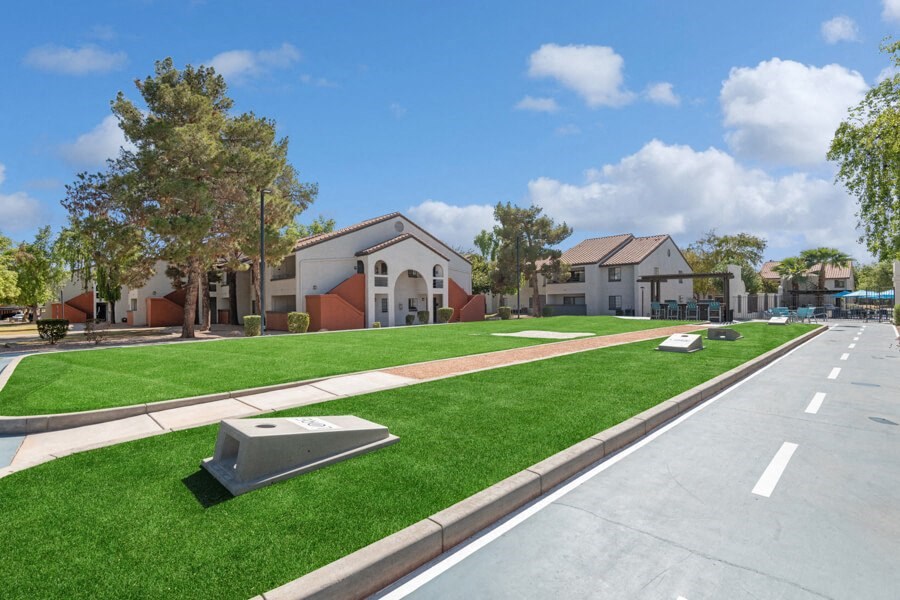 Outdoor cornhole area at Lore South Mountain, Phoenix, 85044
