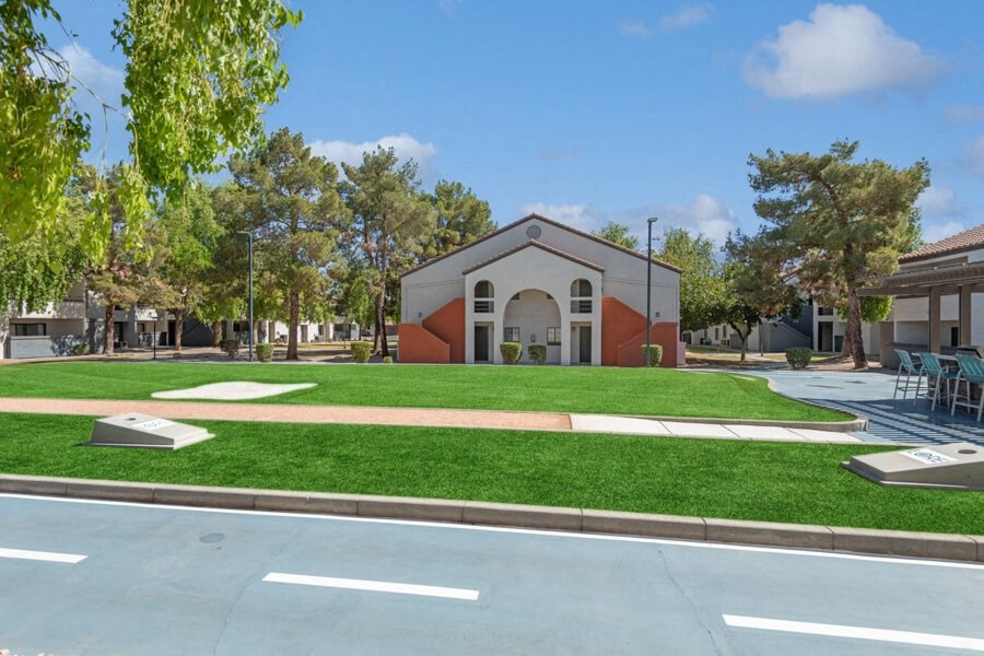 Outdoor cornhole area at Lore South Mountain, Phoenix, Arizona
