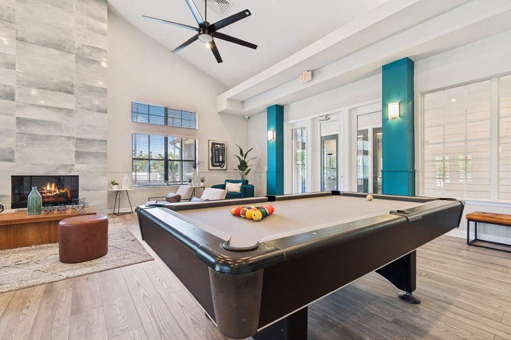 Resident lounge with billiards table at Mirage on Kernan Apartments in Jacksonville, FL