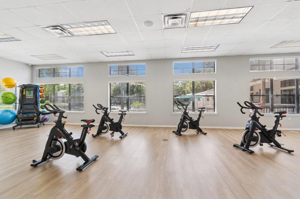 Fitness center with stationary bikes at Mirage on Kernan Apartments in Jacksonville, FL