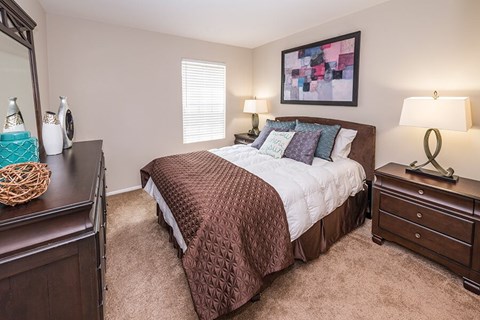 Model Bedroom with Carpet at Misty Ridge Apartments located in Woodbridge, VA.