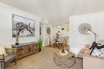 Model living room with view of dining area