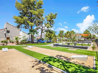 Park area with cornhole courts