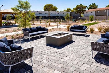 Clubhouse exterior lounge area with firepit