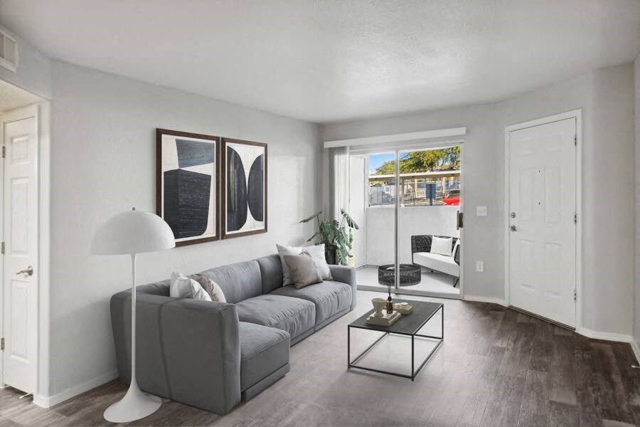 a living room with a couch and a table