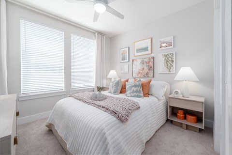 Model bedroom at The Brooke at Rocky Point in Tampa, Florida.