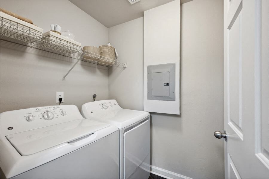 a white washer and dryer in a room