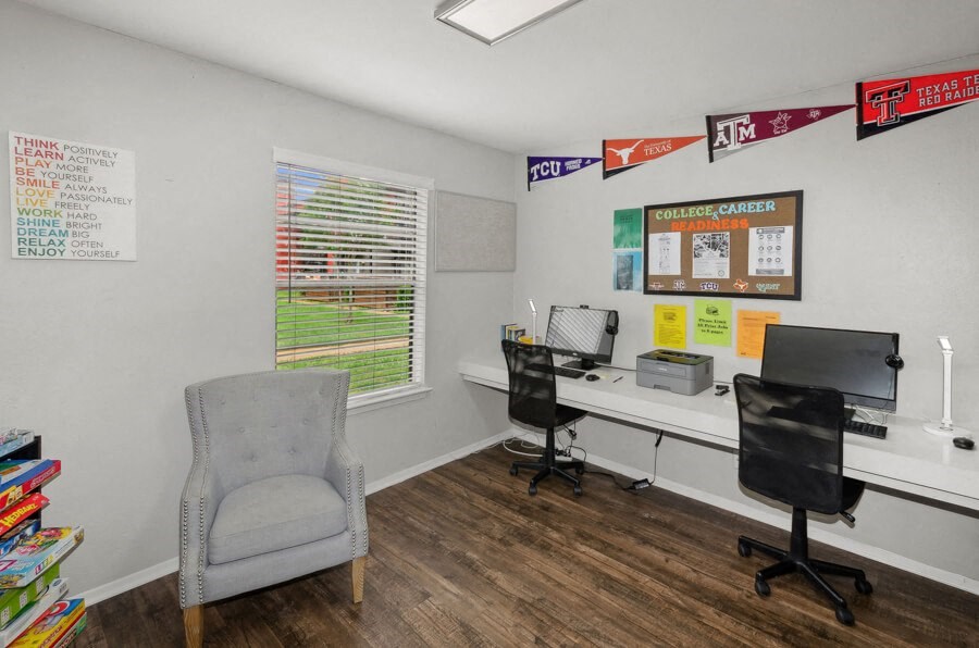 Community resource center with a chair and a desk computers