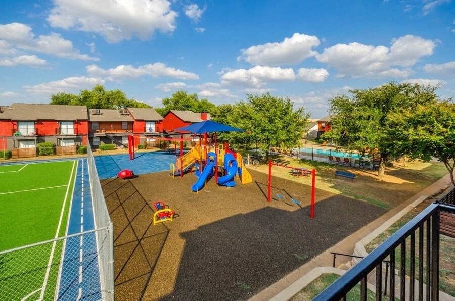 Apartment courtyard with soccer field and playground