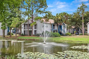 View of community lake with fountain