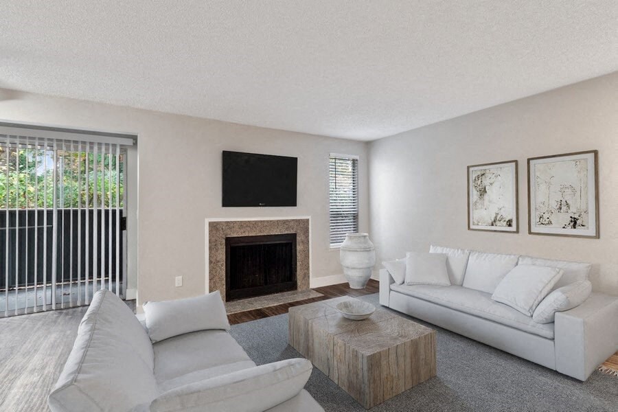 Model living room with private patio/balcony