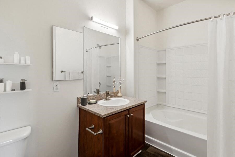 a bathroom with a sink and a bath tub