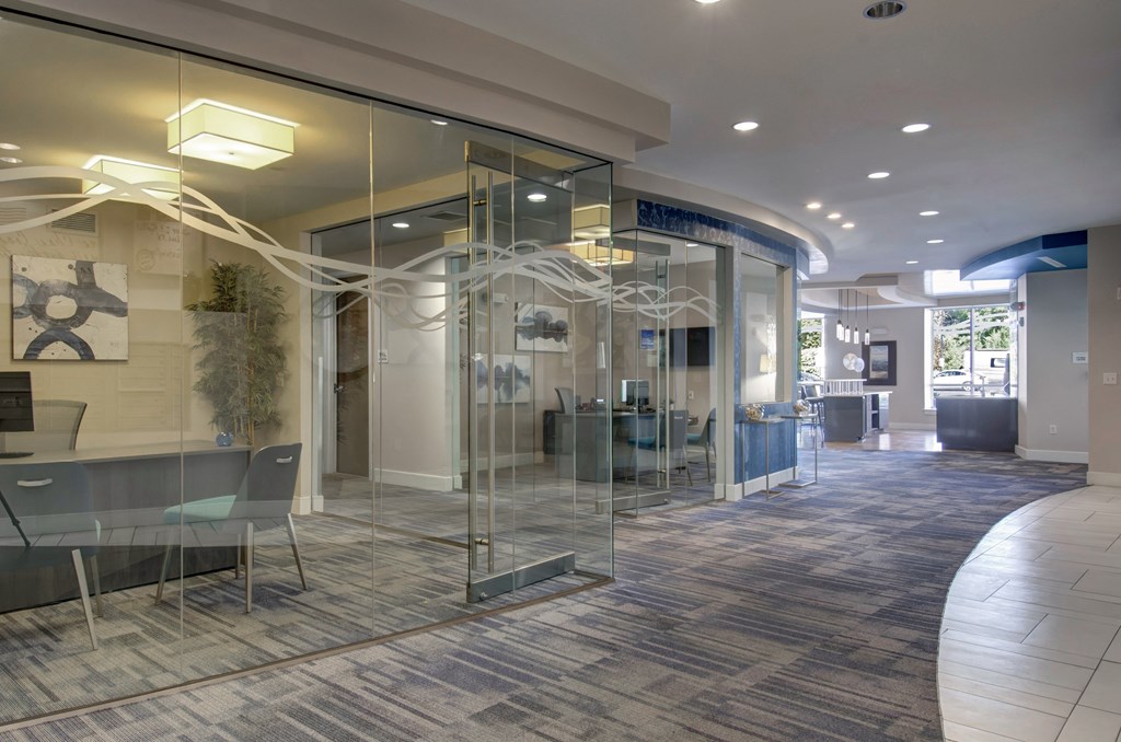 community center- A glass wall separates the office space from the meeting room.