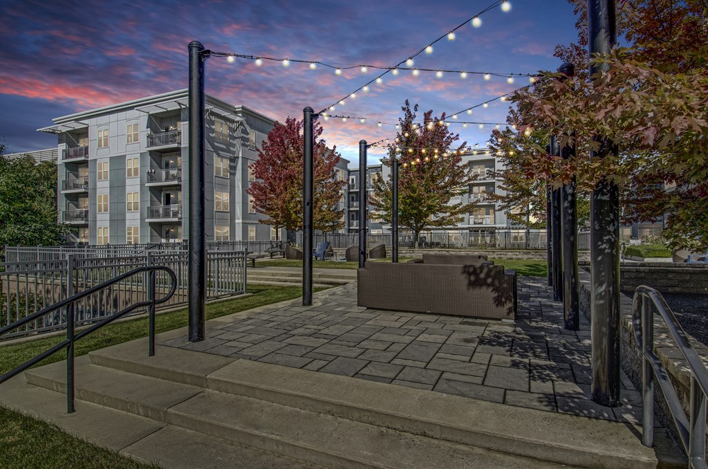 A building with a balcony and a staircase leading to it.