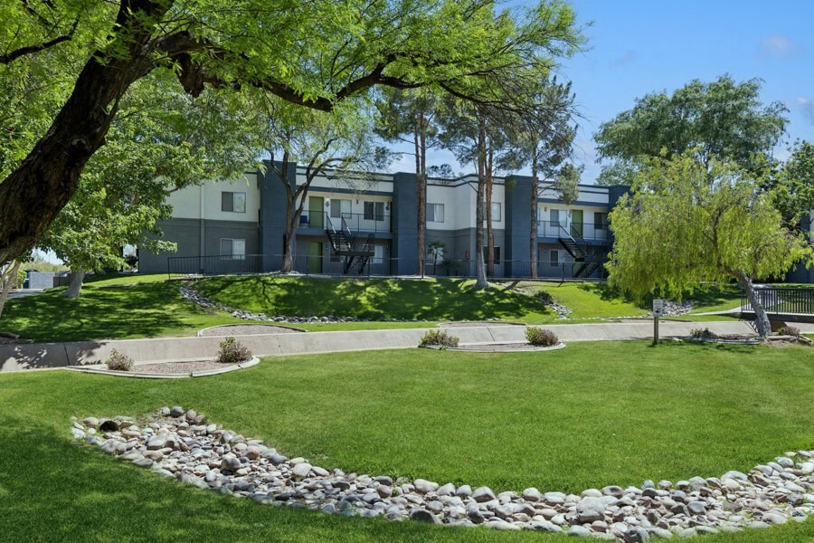Landscaping at San Mateo with grass and trees