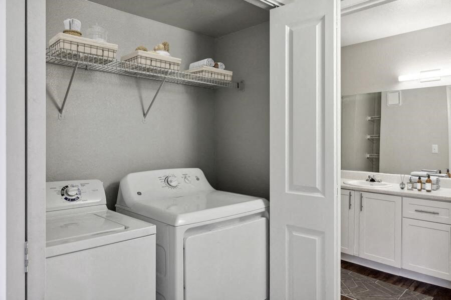 a white washer and dryer in a room