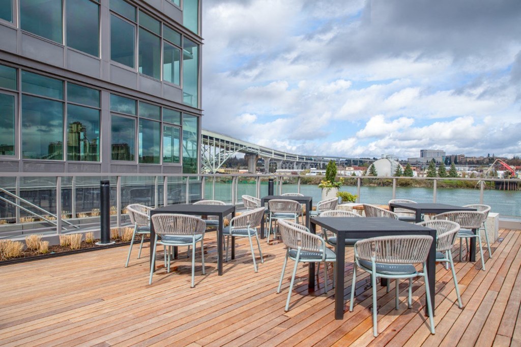 Second floor terrace with seating and grills