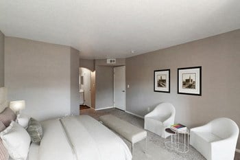 Master Bedroom Master bedroom with reading chairs and private bathroom in the back - Photo Gallery 3