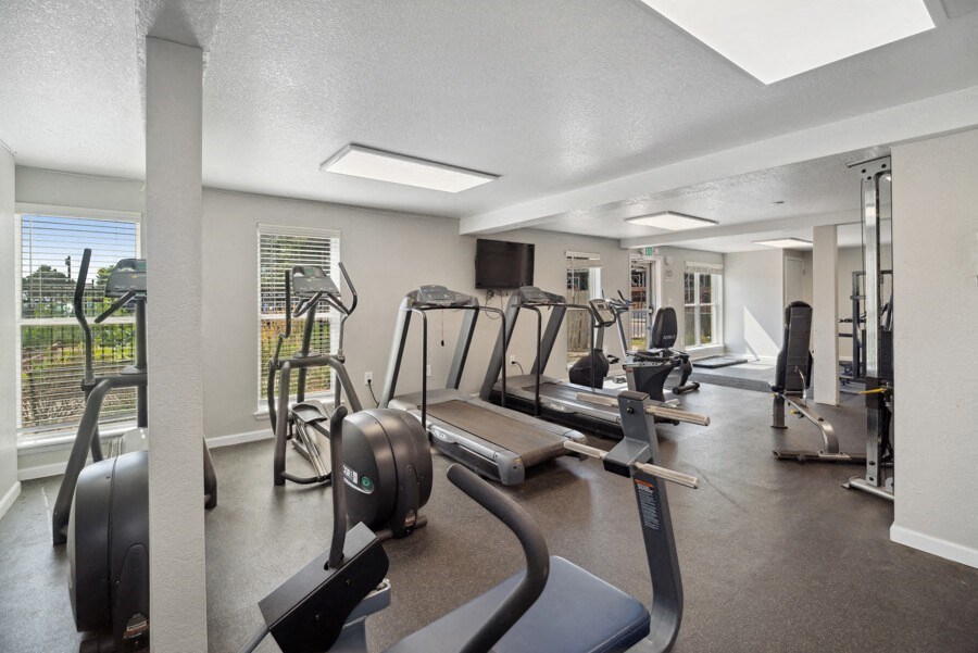 fitness center with exercise equipment