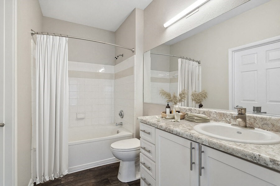 Bathroom with a shower toilet and sink