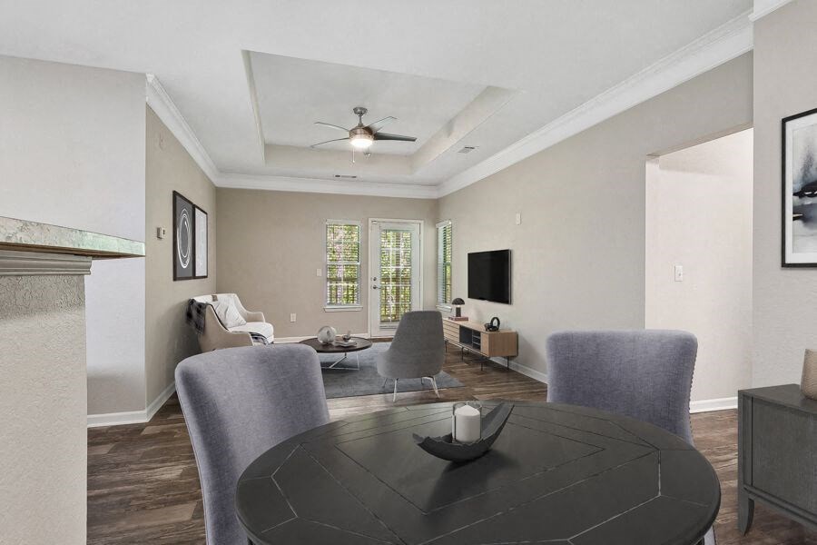 Model apartment dining room with a table and chairs