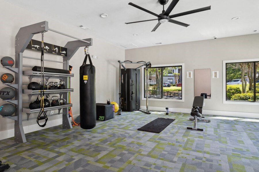 Fitness center with a punching bag and other equipment