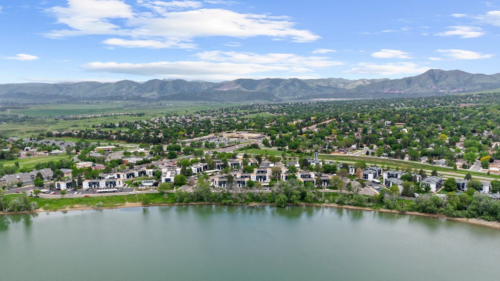 Aerial view of the lake and the apartment community