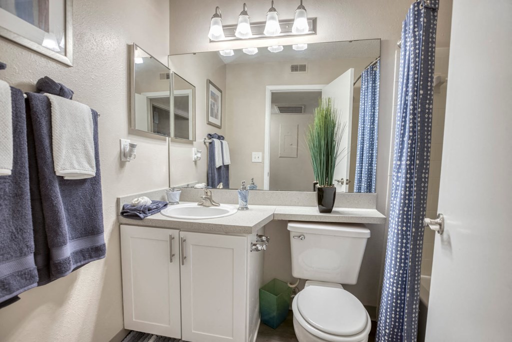 Bathroom with white vanity at Huntington Place Apartments in Sarasota, Florida