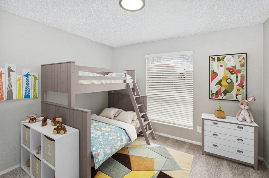 a kids bedroom with a bunk bed and a dresser