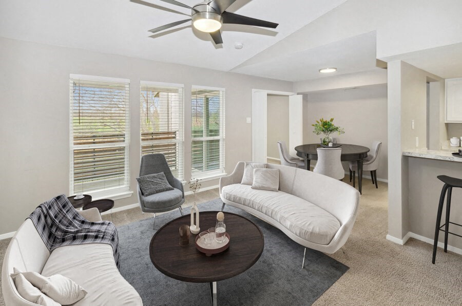 a living room with a couch and a table