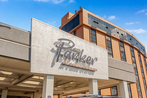 The Parker at Mike's Station building has a large sign on the front.