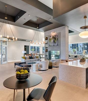 Community Clubhouse with Lounge Furniture at Glen 91 Apartments located in Glendale, AZ-SMLAM.