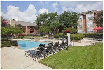 Autumnwood swimming pool with lounge chairs