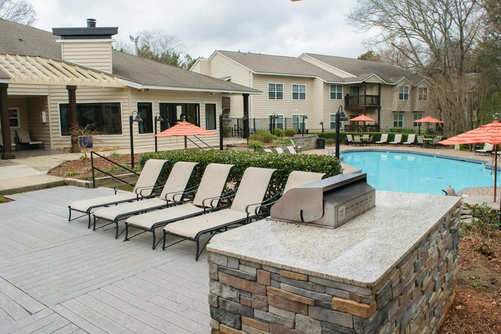 Community pool and lounge chairs